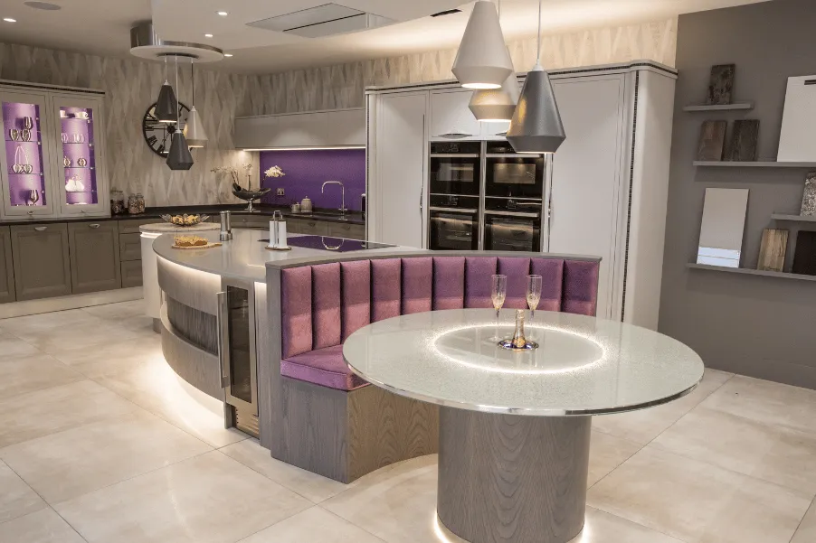 Booth seating on island in kitchen showroom in Cheshunt
