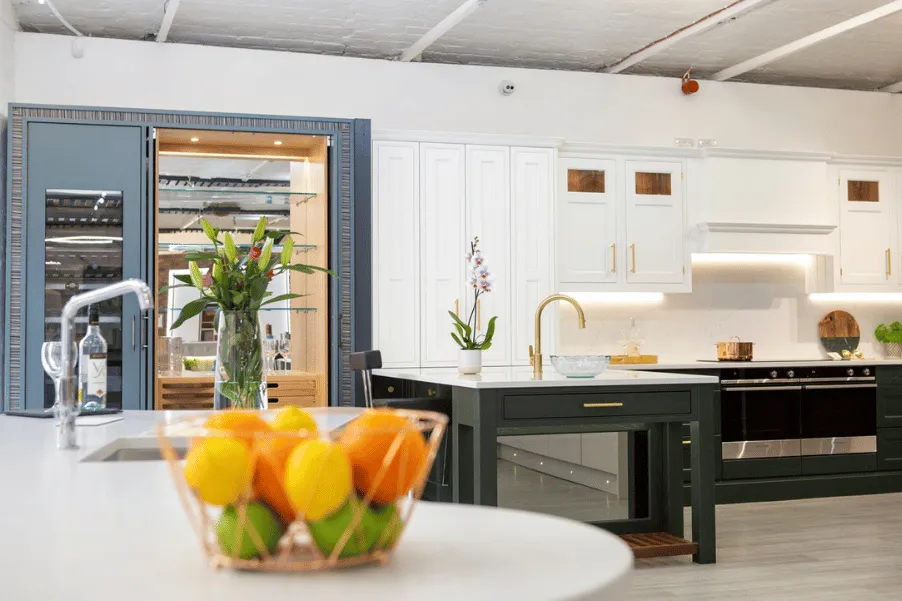 Stoneham classic kitchen display with pocket door bar feature unit in Gardiner Haskins kitchen showroom in Bristol
