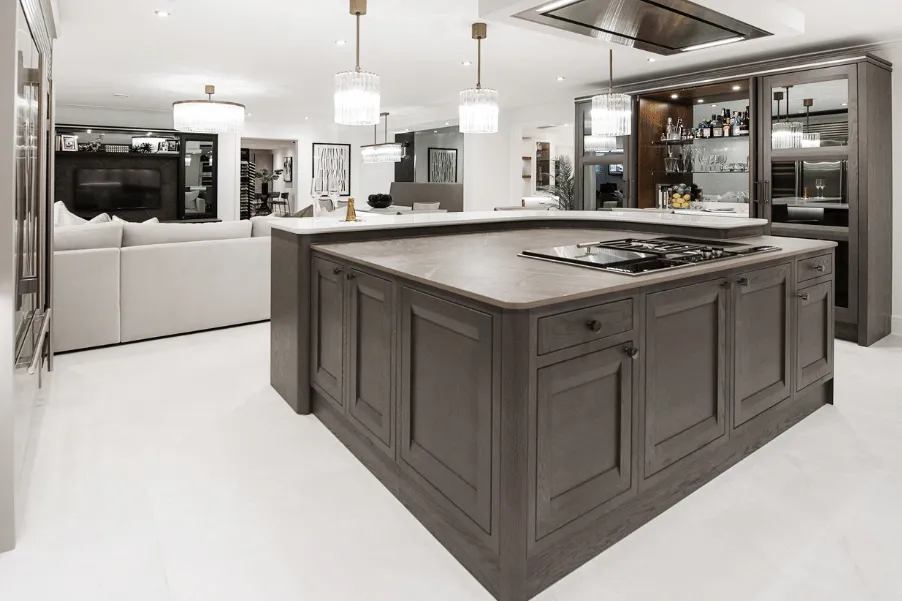 kitchen island with curved breakfast bar in Kitchen Showroom in Essex