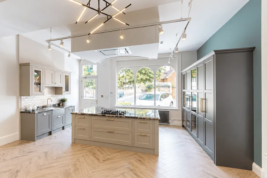 Classic kitchen with cream island and tall cabinets
