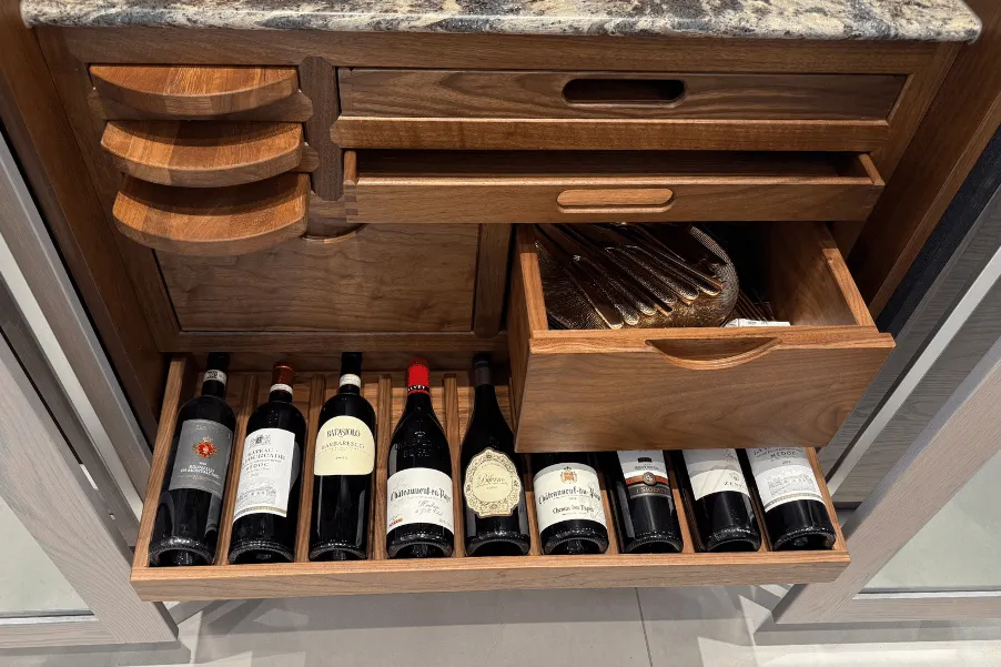 Wooden bar pantry cupboard with wine bottle storage drawer