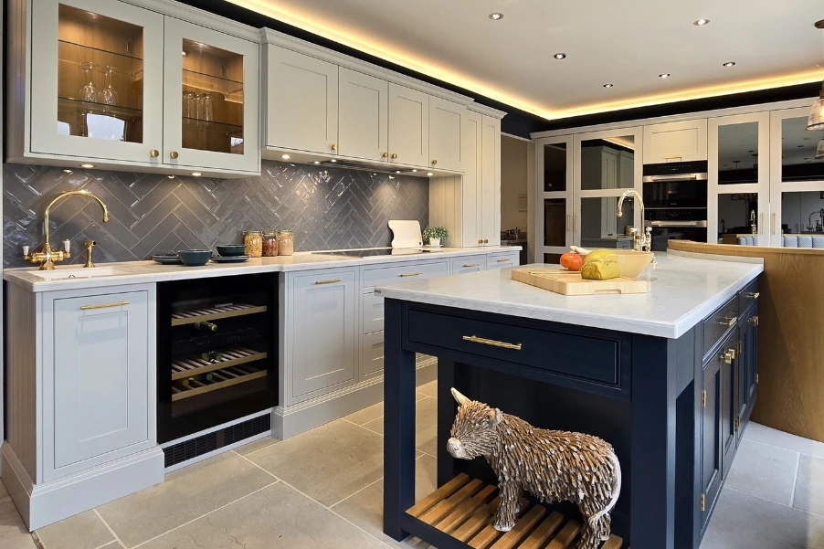 Stoneham classic cabinetry in white with blue kitchen island