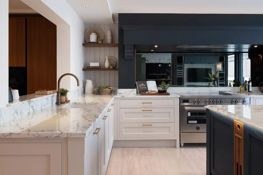 Large hob area with chimney breast feature in white classic kitchen