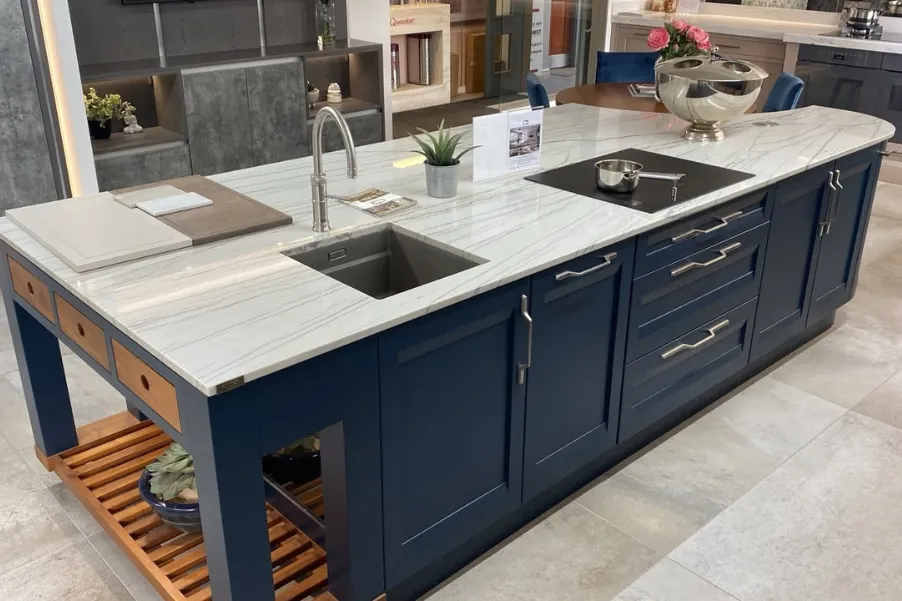 blue kitchen island with wooden slatted shelves
