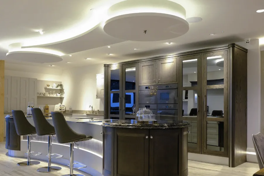 Ceiling bulkhead shaped to mimic the kitchen island below