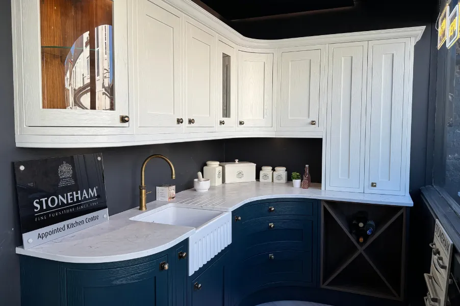 Curved white and blue kitchen units